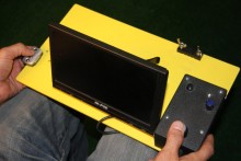 Robotic Plate - This plate allows one to monitor the video from the camera, to zoom and record, and to control the pan and tilt of the motors.